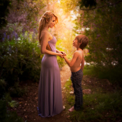 Woman and boy in the forest